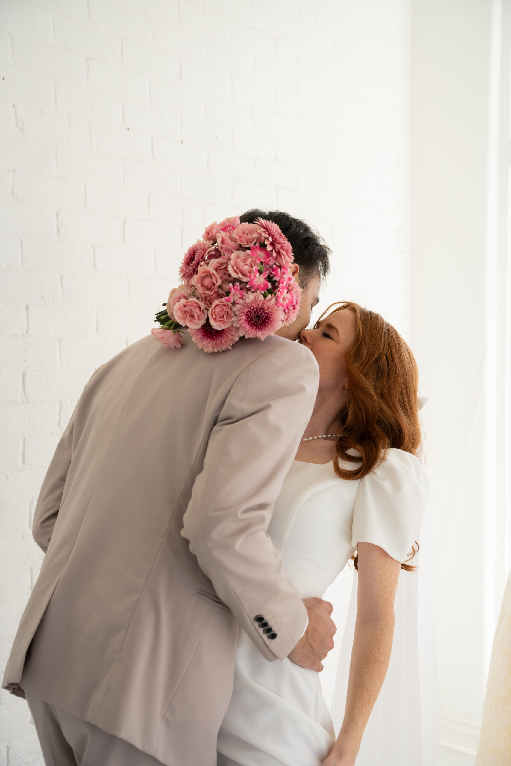 Wedding photo highlighting a beautiful bridal bouquet.